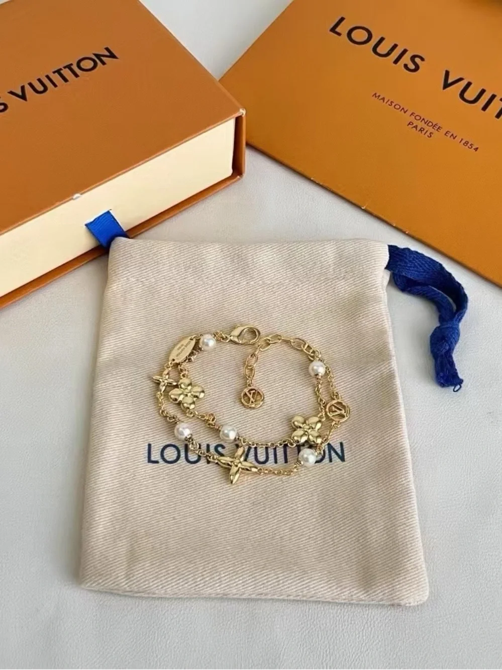 Louis Vuttion Gold Flower & Pearl Charm Bracelet